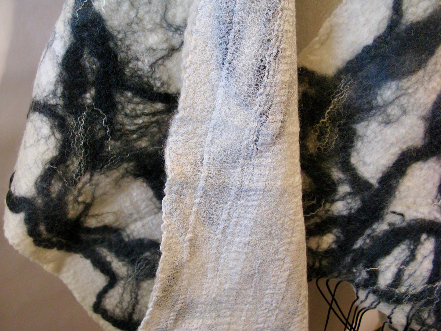 White and black felt shawl with looped fringe