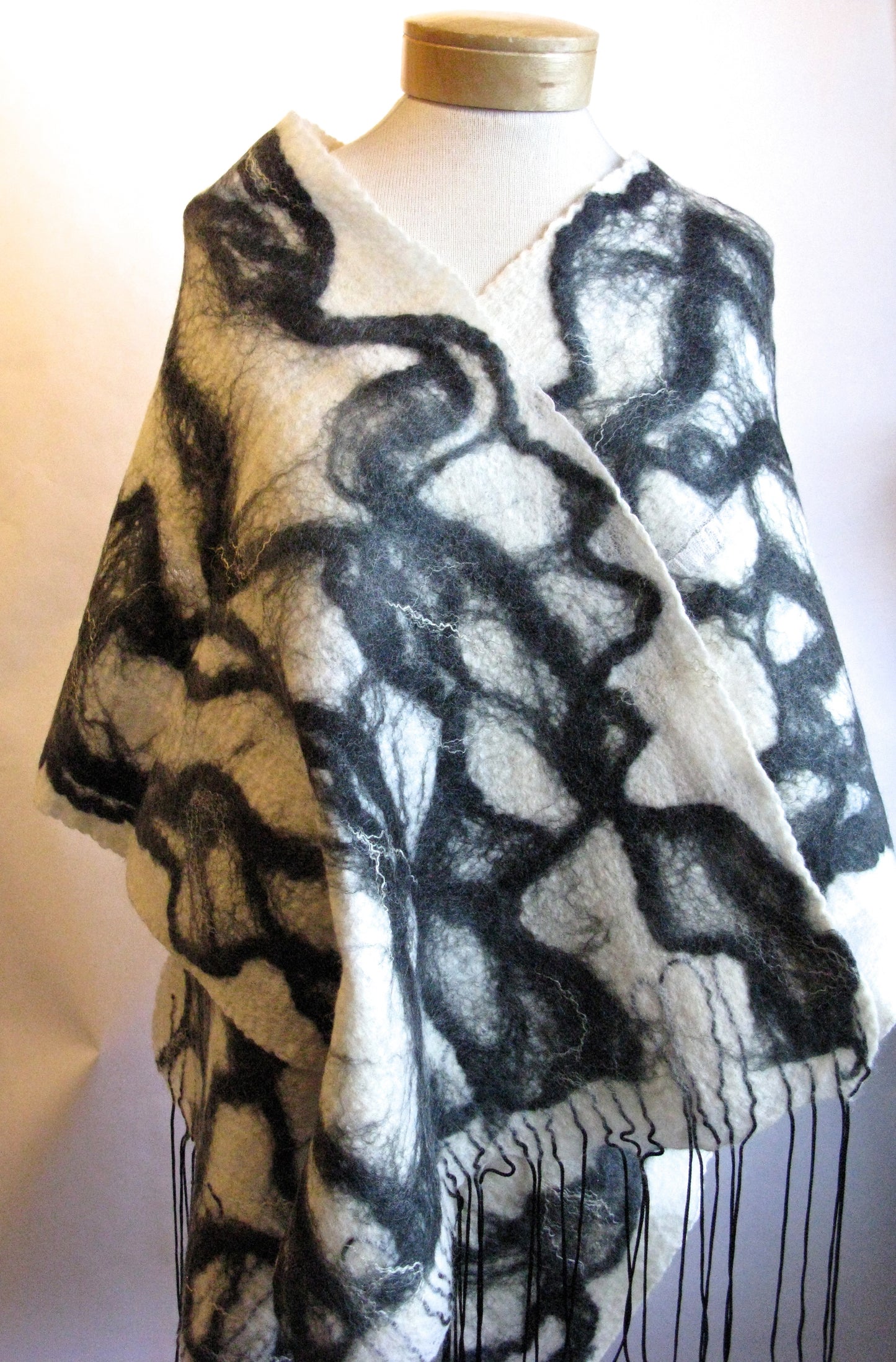 White and black felt shawl with looped fringe